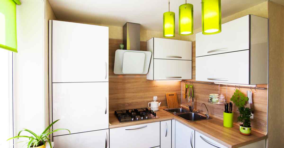 Compact small kitchen design featuring a stylish mix of white and chocoyellow colors.