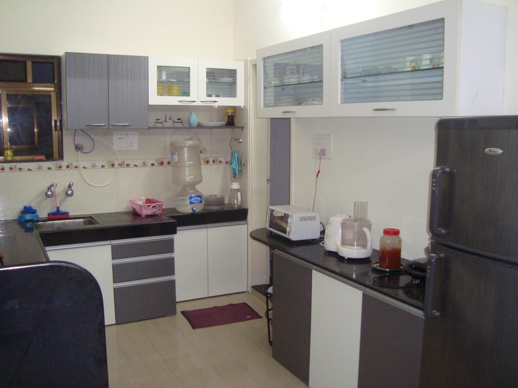 Sleek modular kitchen with stylish cabinets and organized storage