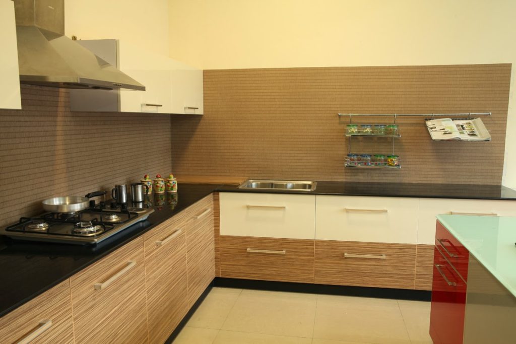 Cozy 1 BHK modular kitchen design in Camp, featuring modern cabinetry and efficient layout.