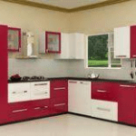 Modern L-shaped modular kitchen in white and red with stylish cabinetry and efficient layout