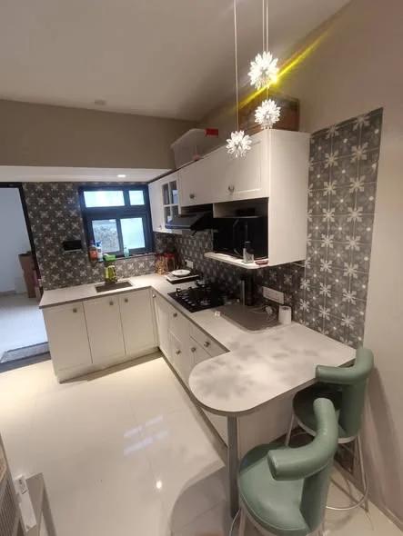 Modular kitchen cabinets with organised storage solutions