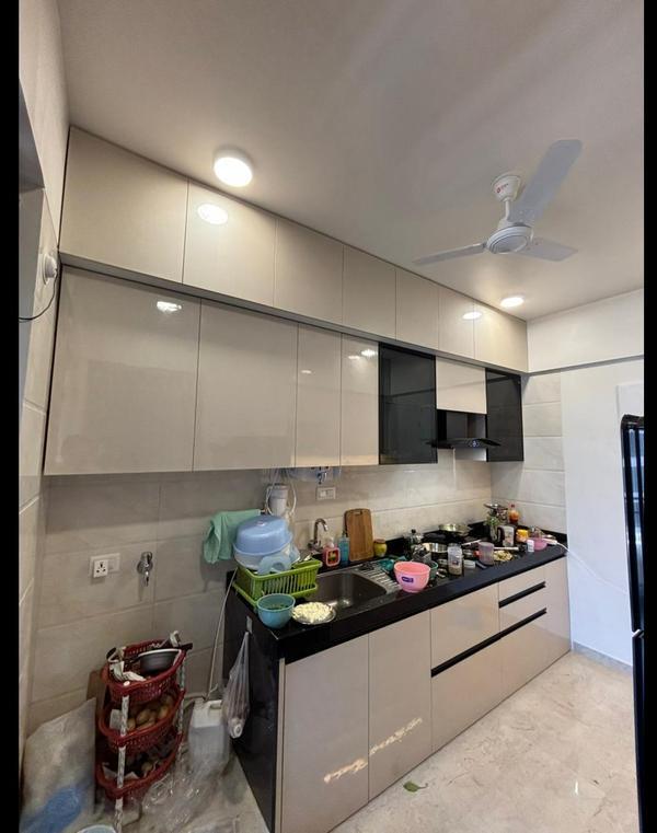 Acrylic modular kitchen designed for a modern Pune home
