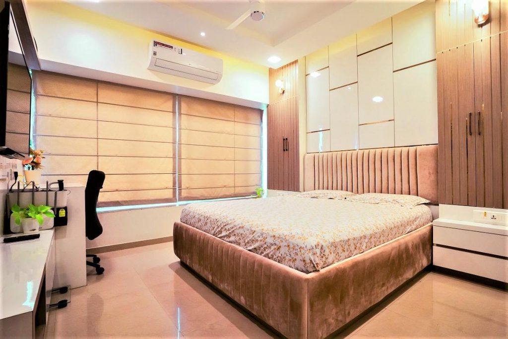 Space-saving furniture arrangement for a small bedroom